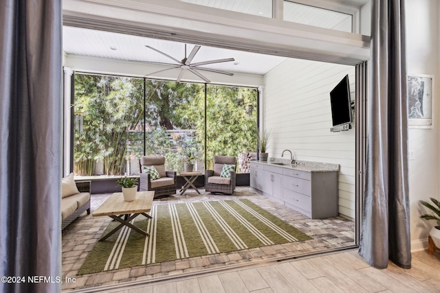 unfurnished sunroom featuring sink