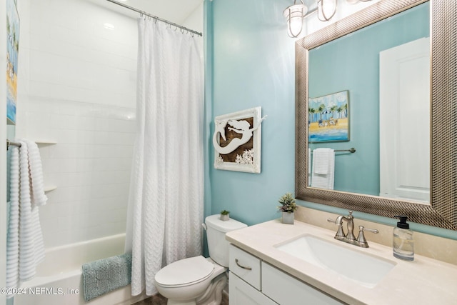 full bathroom with vanity, toilet, and shower / bath combo with shower curtain