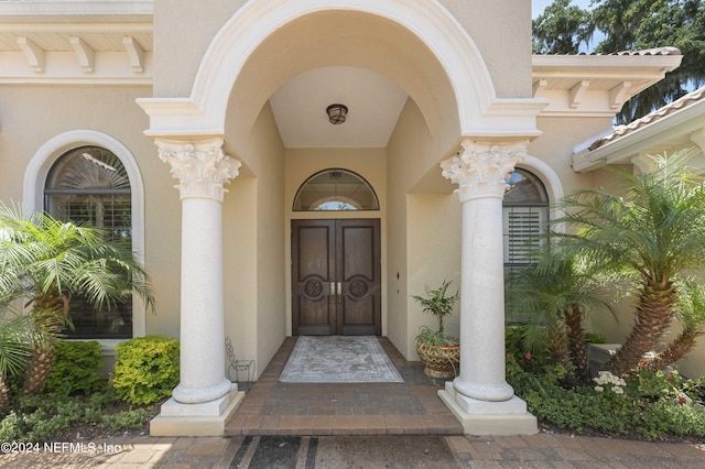 101 Montura Dr, Ponte Vedra Beach, FL 32082 - view of exterior entry featuring stucco siding