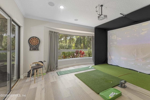 101 Montura Dr, Ponte Vedra Beach, FL 32082 - rec room featuring golf simulator, wood finished floors, crown molding, recessed lighting, and a textured ceiling