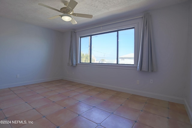 3145 Coastal Hwy Unit 1138, Saint Augustine, FL 32084 - empty room with ceiling fan and a textured ceiling