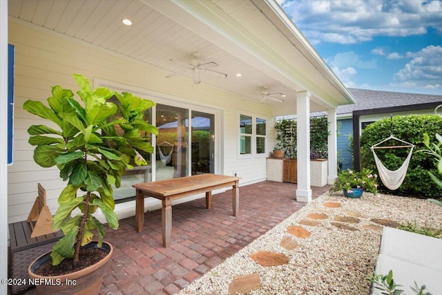 view of patio featuring ceiling fan