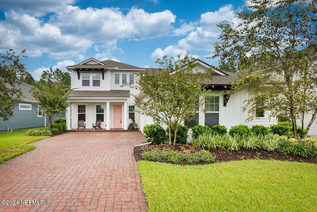 view of front of property with a front lawn