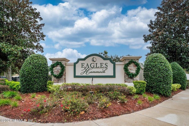 view of community sign