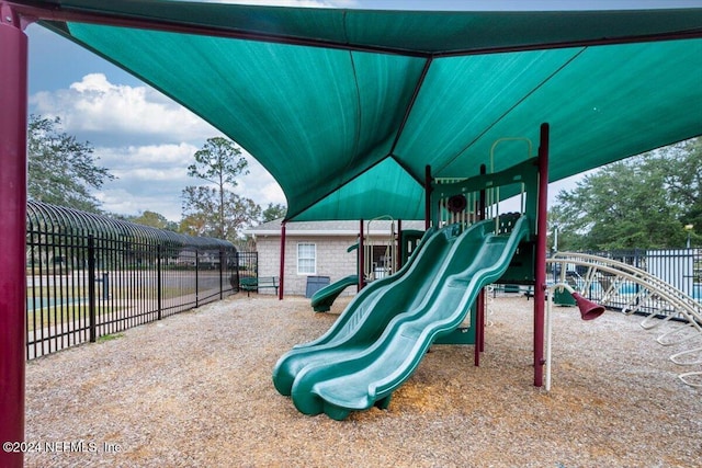 community jungle gym with fence