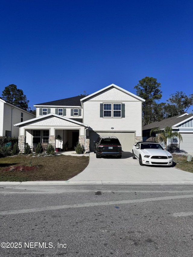 view of front facade with a porch and a garage