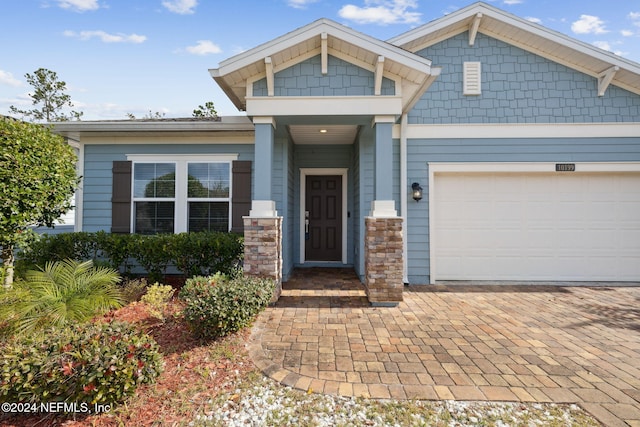 craftsman inspired home with a garage