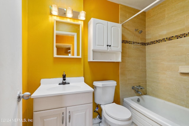 full bathroom with vanity, toilet, and tiled shower / bath combo