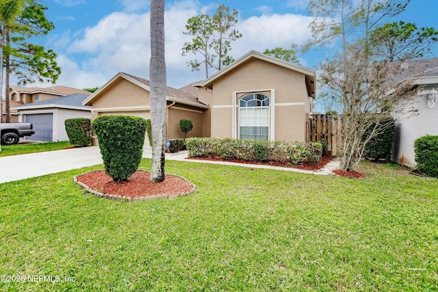 view of front facade featuring a garage and a front lawn