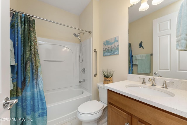 full bathroom with tile patterned floors, shower / bath combo with shower curtain, vanity, and toilet