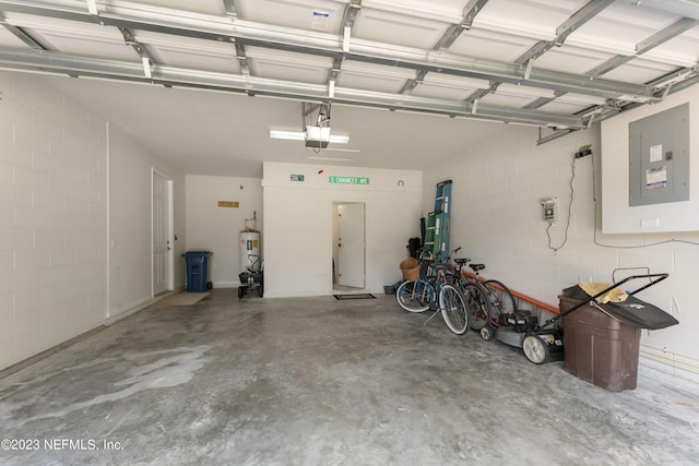 garage with electric water heater, electric panel, and a garage door opener