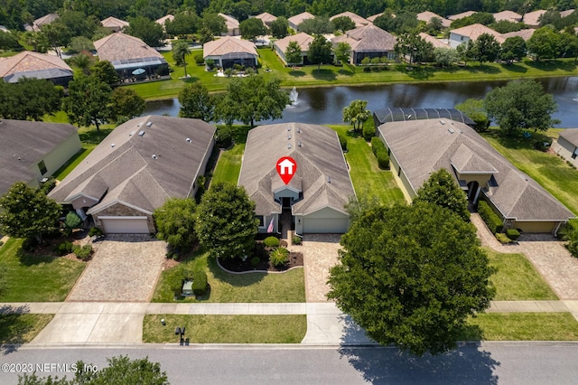 drone / aerial view featuring a water view