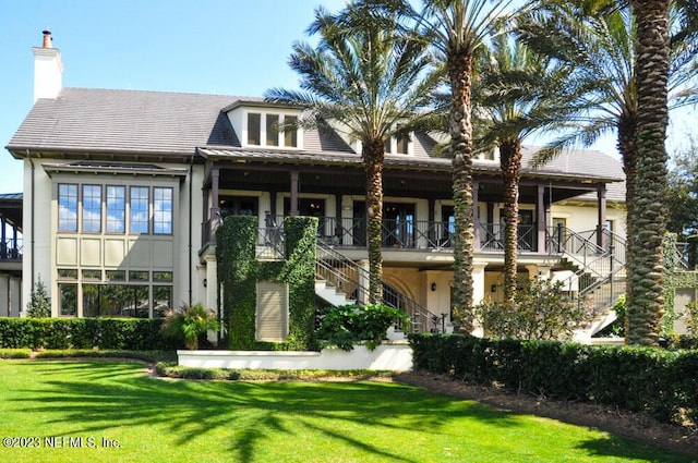 view of front of house with a front yard