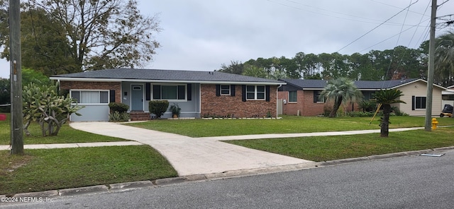 single story home featuring a front yard