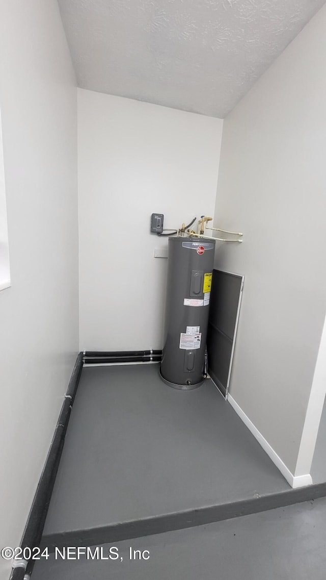 utility room with water heater