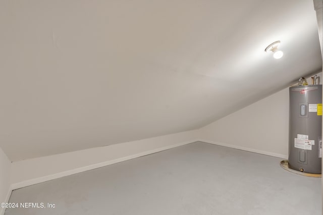 utility room featuring electric water heater