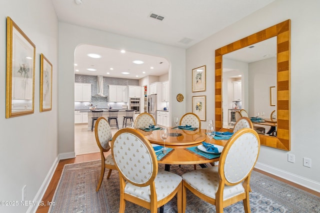 dining room featuring light hardwood / wood-style flooring