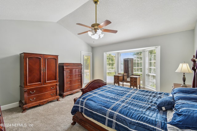 bedroom with ceiling fan, light colored carpet, and lofted ceiling