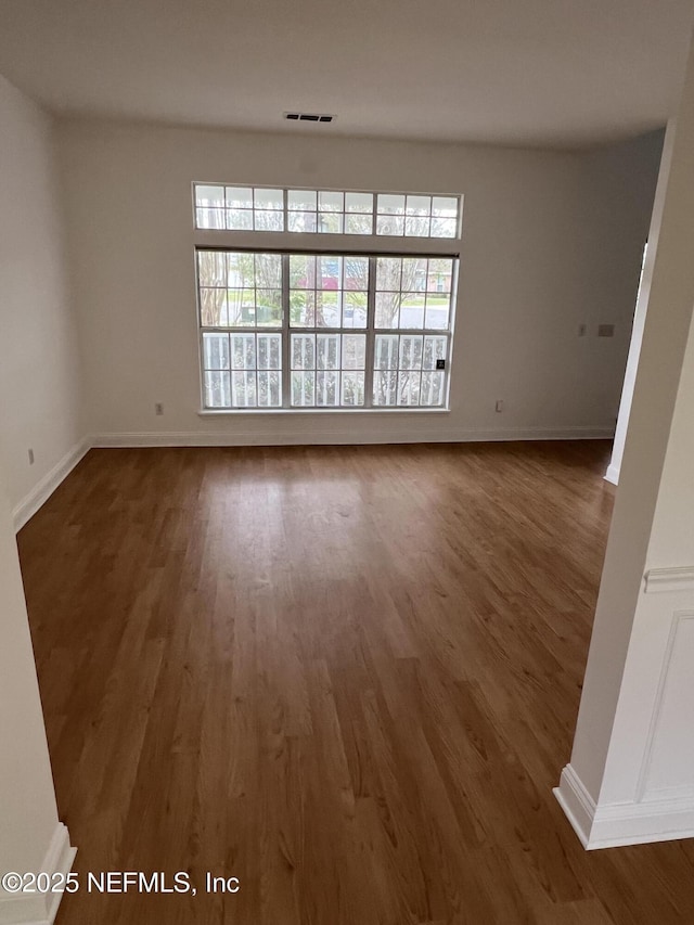 2305 Locustwood Ct, Orange Park, FL 32065 - spare room featuring wood finished floors and baseboards