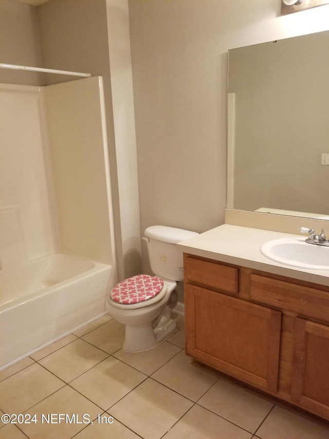 full bathroom featuring tile patterned floors, vanity, toilet, and bathing tub / shower combination