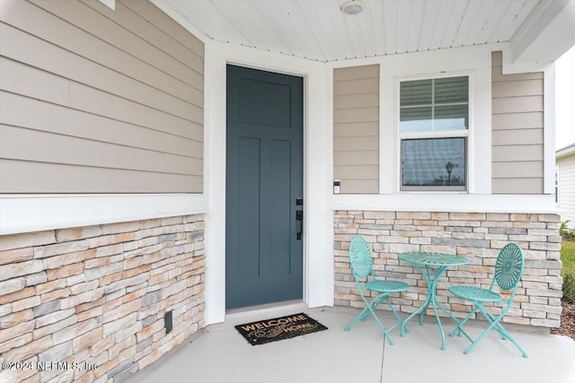 entrance to property with covered porch