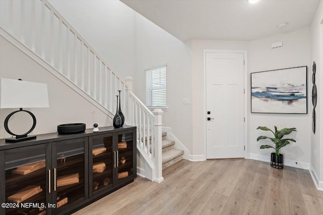 foyer with light hardwood / wood-style flooring