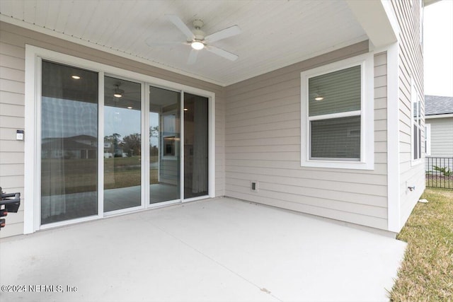 view of patio featuring ceiling fan