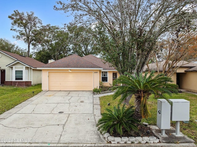 single story home featuring a garage