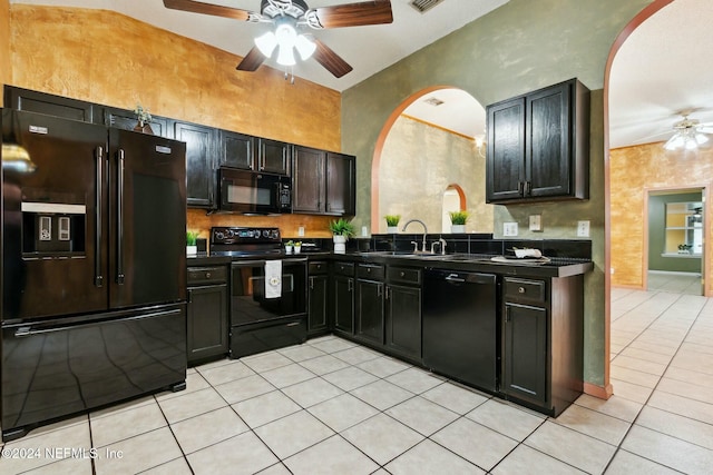 kitchen with black appliances, ceiling fan, light tile patterned floors, and sink