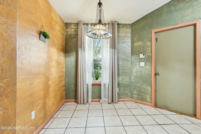 entrance foyer featuring a chandelier