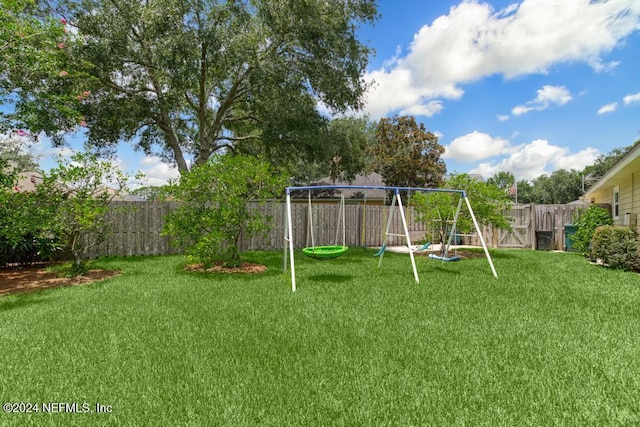 view of yard with a playground