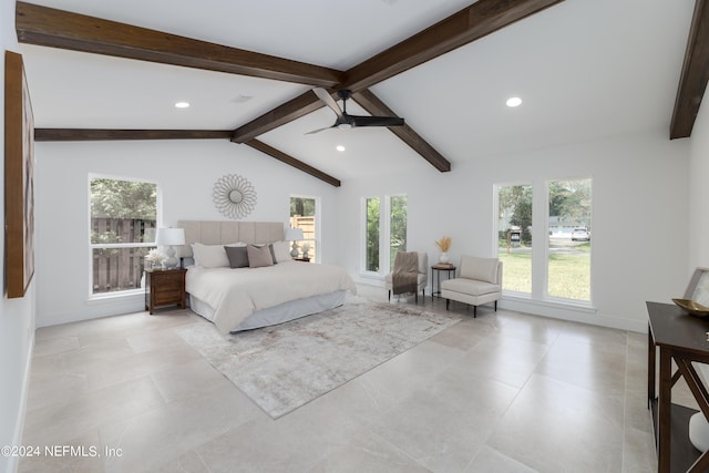 bedroom featuring lofted ceiling with beams, ceiling fan, and multiple windows