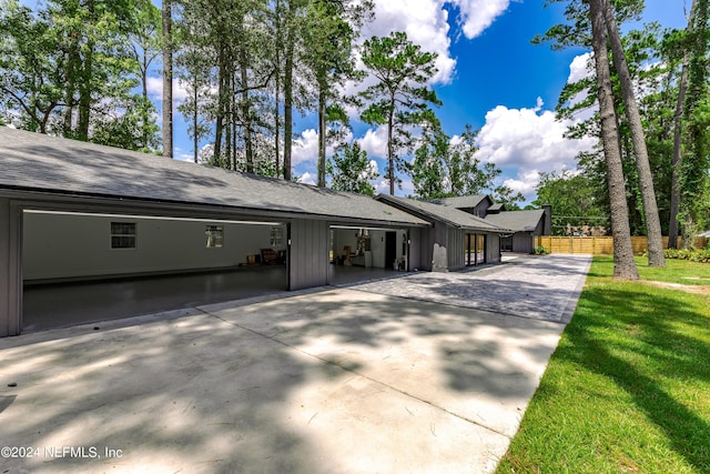 view of home's exterior with a lawn