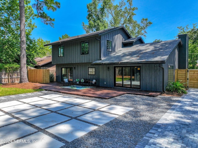 back of house featuring a patio