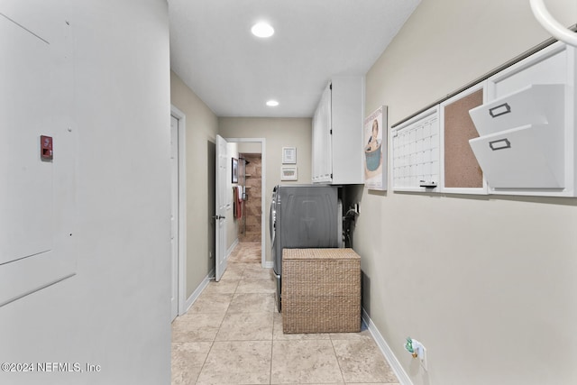 corridor with light tile patterned floors