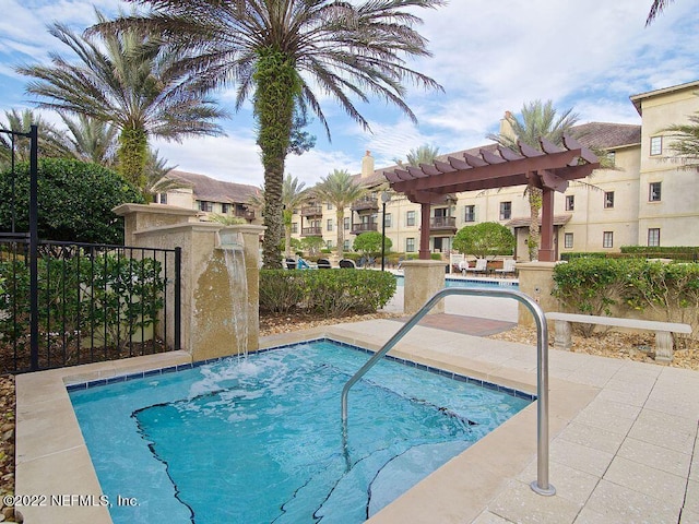 view of pool with a pergola