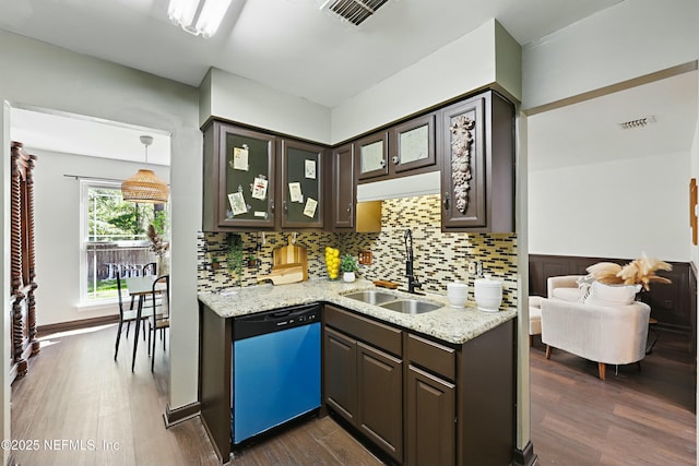 11657 Tanager Dr, Jacksonville, FL 32225 - kitchen with visible vents, a sink, glass insert cabinets, dark wood-style floors, and dishwashing machine
