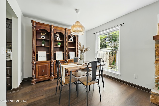 11657 Tanager Dr, Jacksonville, FL 32225 - dining space with baseboards and dark wood-style flooring