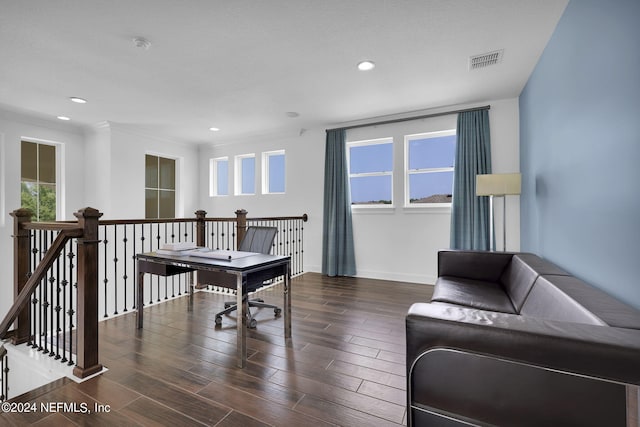 home office with dark hardwood / wood-style flooring