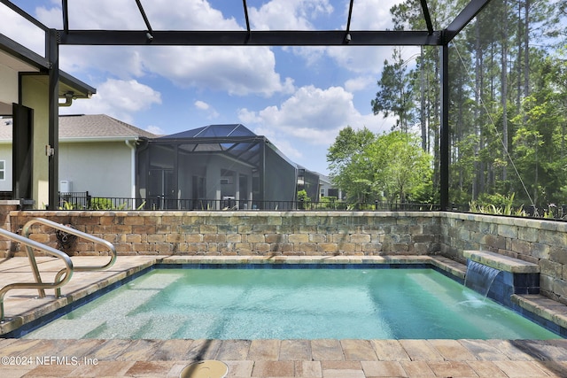 view of swimming pool featuring pool water feature and a lanai