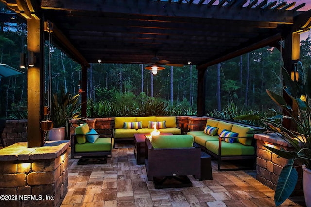 view of patio with a pergola, an outdoor living space, and ceiling fan