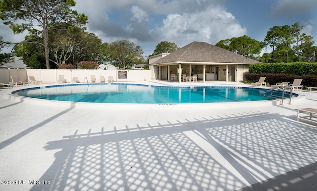 view of pool with a patio area