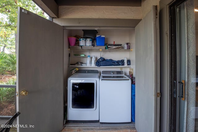 laundry room featuring washer and clothes dryer