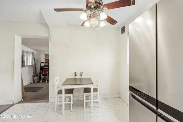 dining room featuring ceiling fan