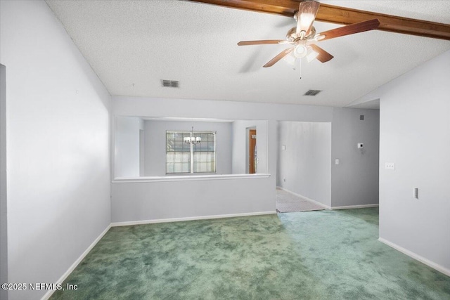 unfurnished room featuring carpet flooring, a textured ceiling, lofted ceiling with beams, and ceiling fan with notable chandelier