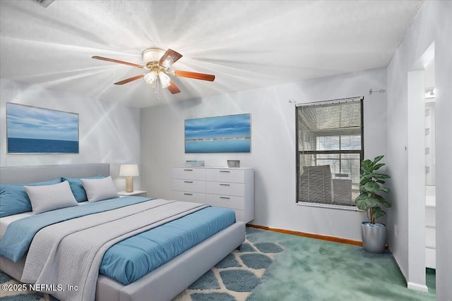 bedroom featuring carpet, connected bathroom, and ceiling fan