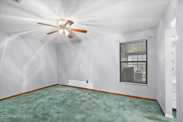 carpeted empty room with a textured ceiling and ceiling fan