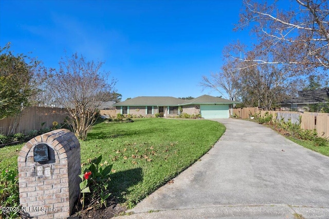 single story home featuring a front lawn and a garage