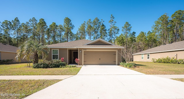 ranch-style home featuring a garage and a front yard