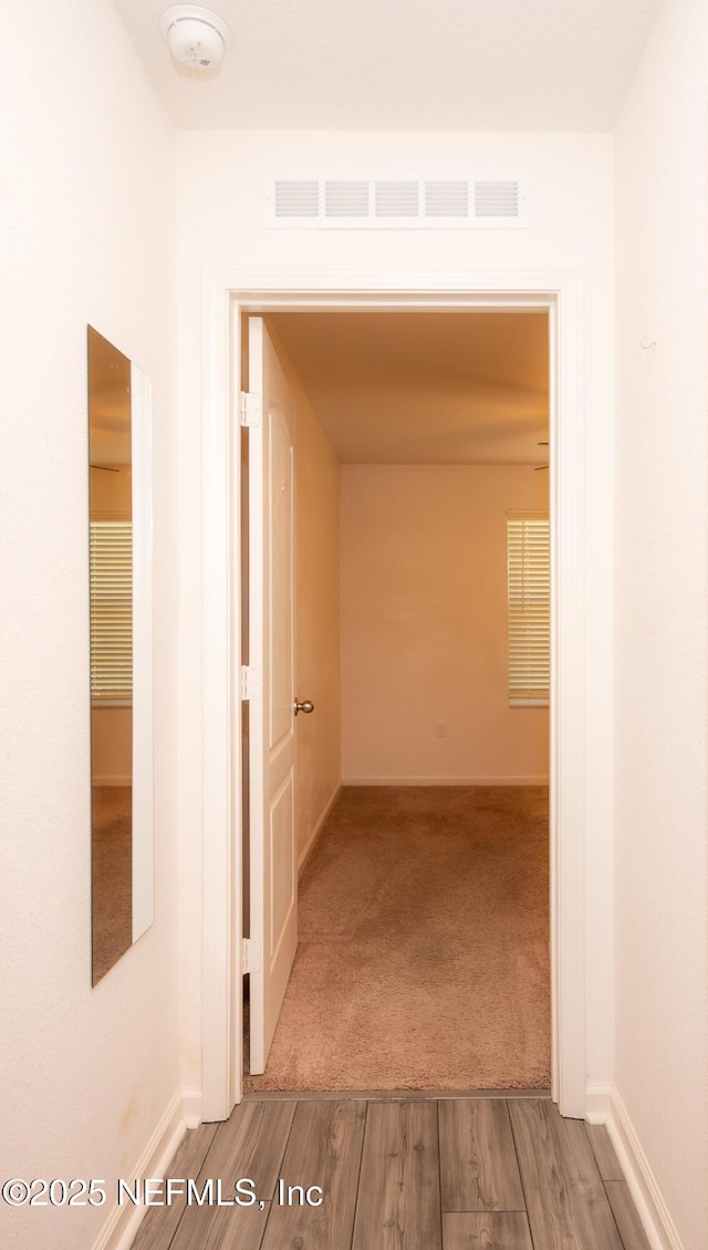 hall featuring hardwood / wood-style flooring